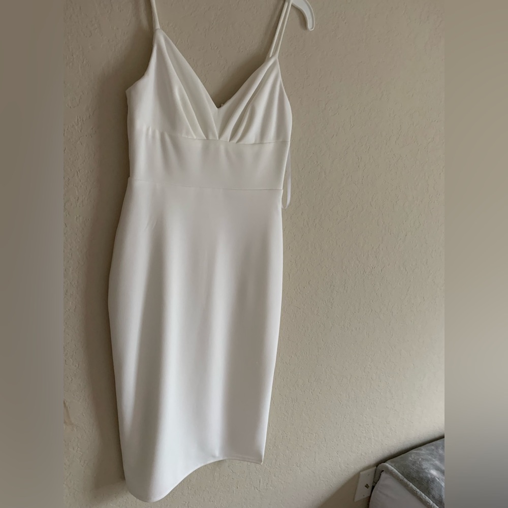 White knee length dress